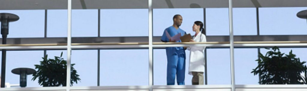 Doctors chatting in a hallway